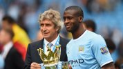 manuel-pellegrini-yaya-toure-manchester-city-premier-league-trophy_3300048.jpg