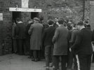 football-fans-queue-up-to-enter-old-trafford-football-stadium-1964.jpg