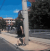 walking-into-pole-walk-pole.gif