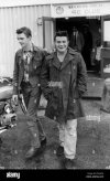 antony-doab-and-his-son-paul-16-leave-the-moss-side-inquiry-today-ENHHFG.jpg