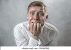 scared-man-bites-his-nails-260nw-509360548.jpg