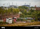 trees-growing-on-the-abandoned-closed-elevated-railway-arches-blind-K3W32C.jpg